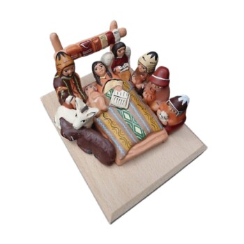 Nacimiento con Virgen en la cama