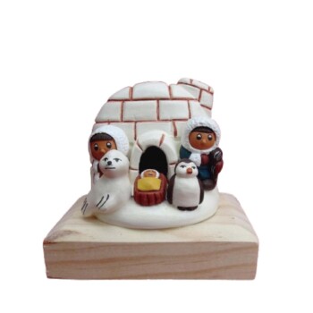 Iglu con pingúino y morsa