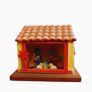 Casa amarilla con flores